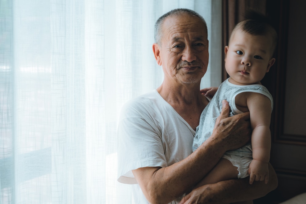 Father reading a picture book with his toddler